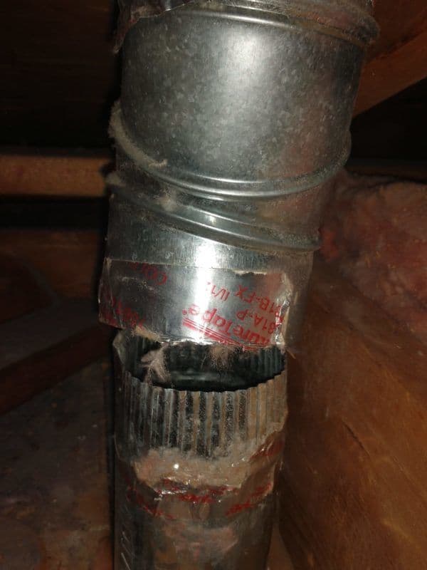 Picture of a dryer vent disconnected in an attic in Gaithersburg, MD