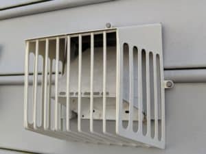Picture of a Defender brand bird guard on a dryer vent. This was from a bird guard installation in Frederick, MD.
