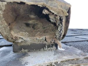 Roof dryer vent cover and flap clogged with lint in Fairland, MD. Urbana Dryer Vent Cleaning performed the dryer vent cleaning service for this roof dryer vent in Fairland.